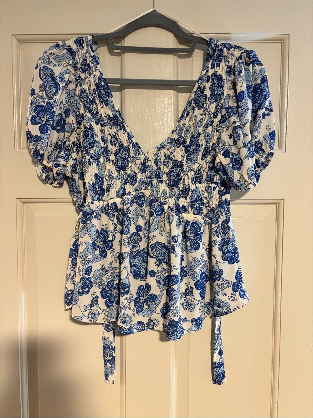 Sienna Sky Blue Floral Smocked V-Neck Peplum Blouse